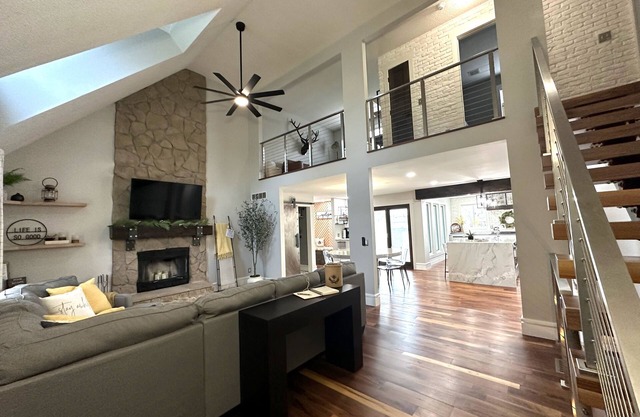 High-end home w/fireplace, gourmet kitchen, sauna, game rm/large yard/fire pit