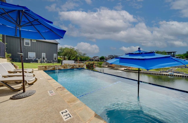 Highly rated home with private pool, hot tub and 90 feet of waterfront!