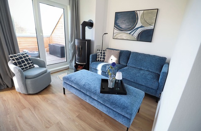 HimmelFrei - Holiday apartment with water view. Sauna. Two roof terraces.