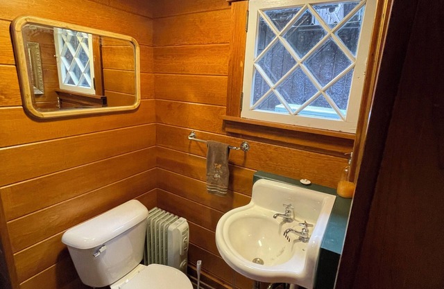 Historic 1908 “Great Camp” with private sandy beach, dock and WI-FI on Long Lake