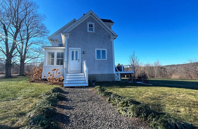 Historic riverfront home with skiing, golf nearby, deck, & washer/dryer