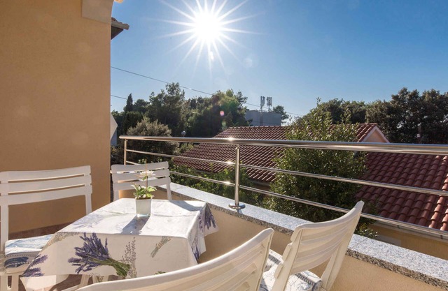 Holiday apartment with balcony and air conditioning