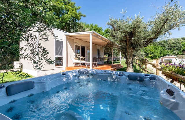 Holiday Home "Casa Mobile Casa Est Garda" with Lake View, Shared Pool & Wi-Fi