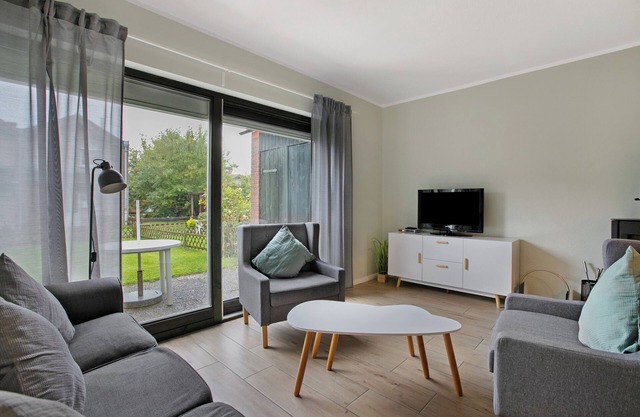 Holiday home "Deichkönig" directly in the spa centre, private terrace and WLAN