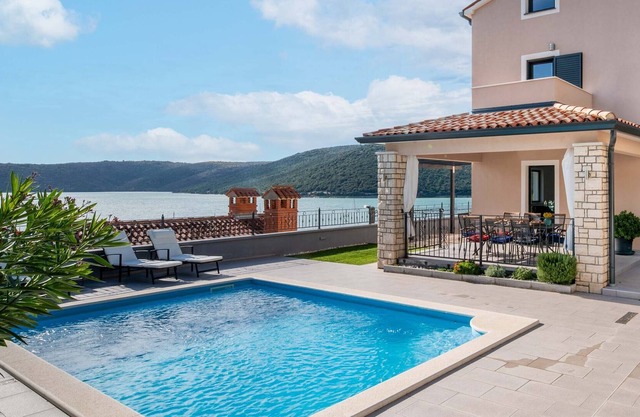 Holiday home near the sea with a stunning view