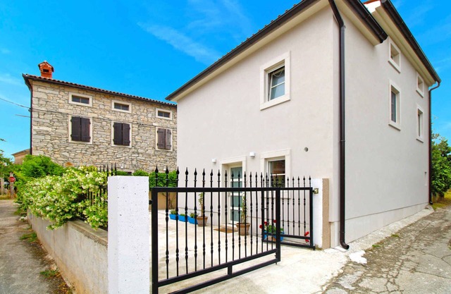 Holiday home with large terrace and barbecue