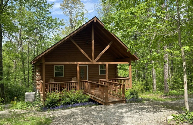 Hot tub, Log Fireplace, Large Fire pit, large decks.