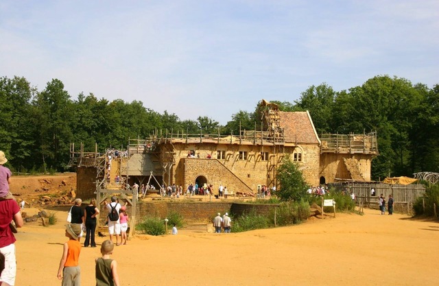 House in a typical village between lake and forest