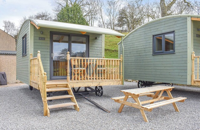 Its a Shepherds Hut underneath with the size and comforts of a pod on top.