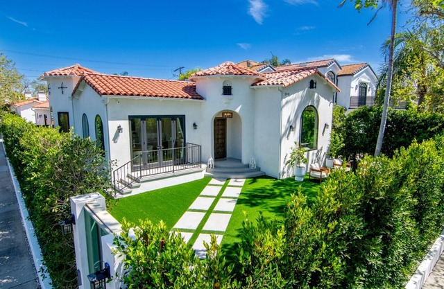 Impeccable Brand New, no expenses spared remodeled Spanish Contemporary.