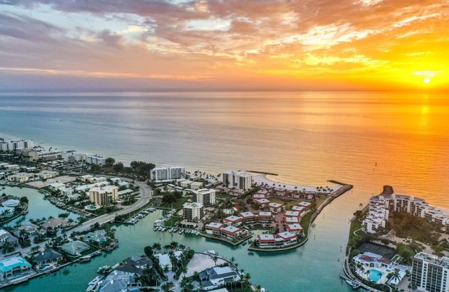 Impeccable Condo Across from the Moorings Private Beach plus Private Boat Dock