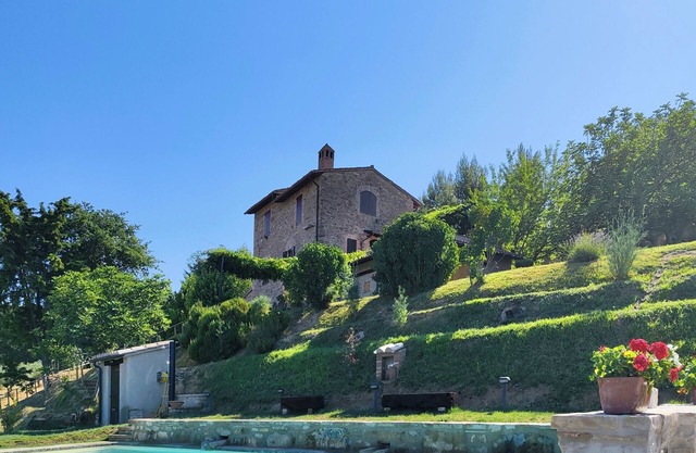In a large park and with a swimming pool with spectacular views of the valley.
