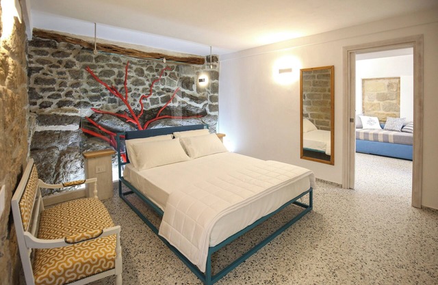 In the center of the ancient Borgo delightful apartment, equipped with all comforts