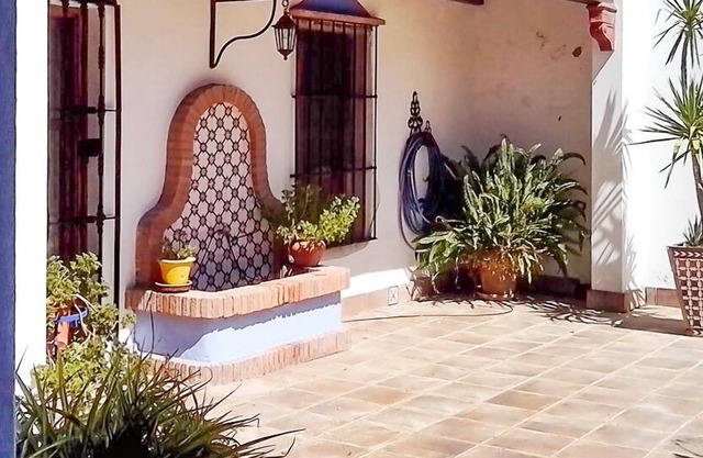 In the province of Seville, well decorated Andalusian villa with large terrace overlooking the mountains &