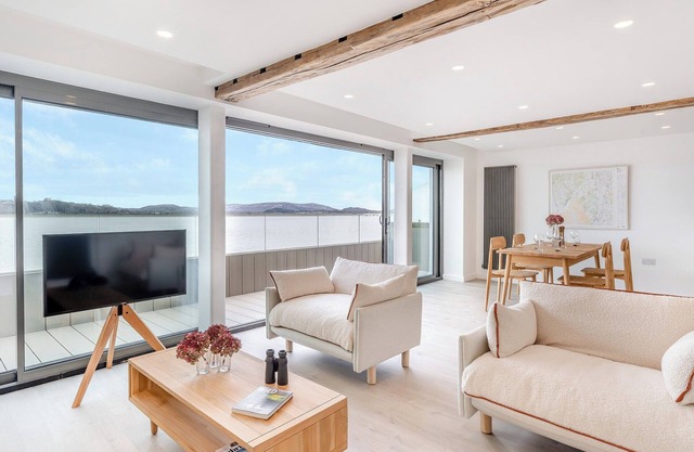 Indulge in seaside luxury at this immaculate first and second floor apartment.