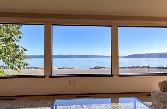 Island-View Getaway – Waterfront Setting with Deck & Grassy Yard