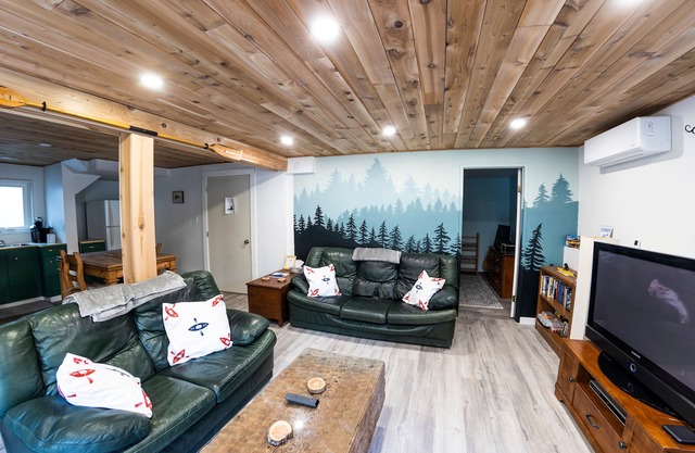 Kayak Themed basement suite close to stores and trails.