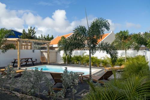 Kindvriendelijke 3 slaapkamer appartementen met zwembad, tropische tuin en vlakbij stranden