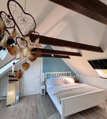 Lüttje Koje - Ferienhaus direkt am Deich und dem Meer dahinter