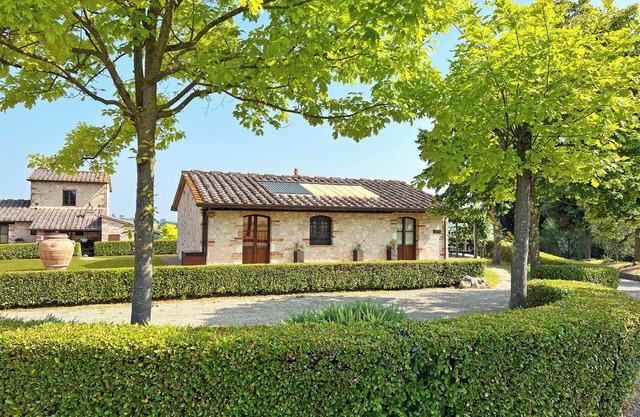 La Capannina with view over the green tuscany hills