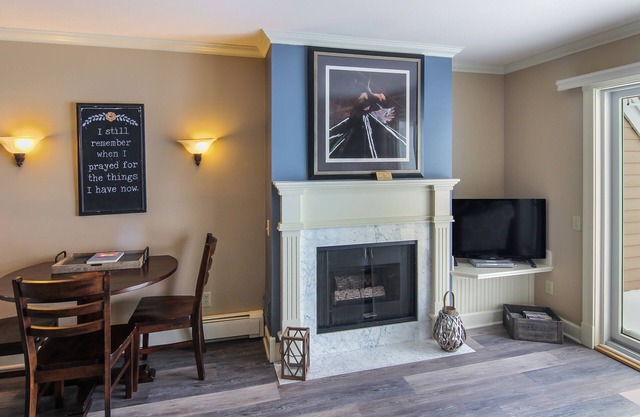 Lake Charlevoix Top-Floor Balcony Condo | Gas-Log Fireplace | Private Beach