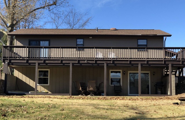 Lake of Egypt 4 bedroom home sleeps 8 with dock and flat yard and lakefront!