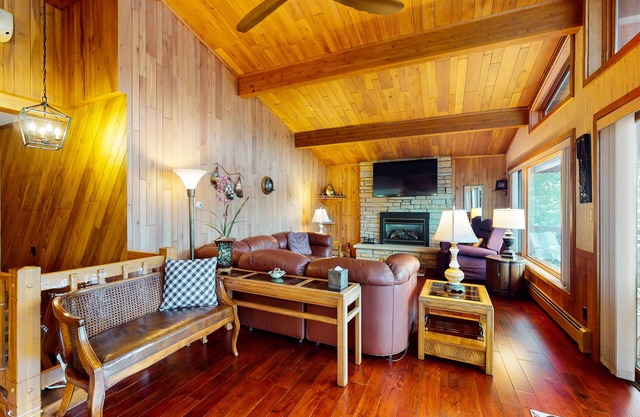 Lakefront home on South Two Lakes with lake views, lake access, firepit, & dock
