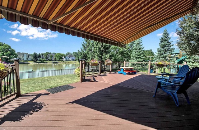Lakeside 4-Bedroom Retreat with Kids’ Play Area & EV Charger