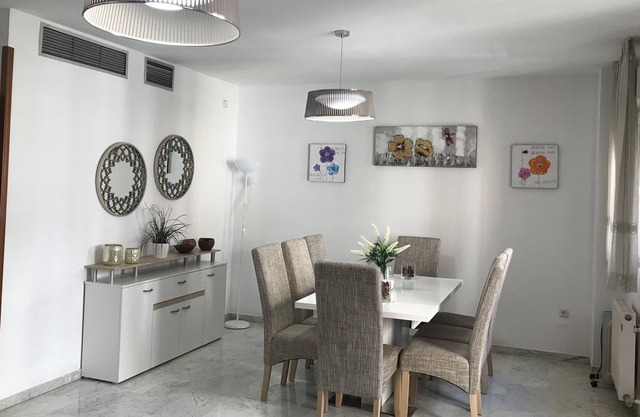 Large, central and bright, AC and heating. Private parking. Also long rentals