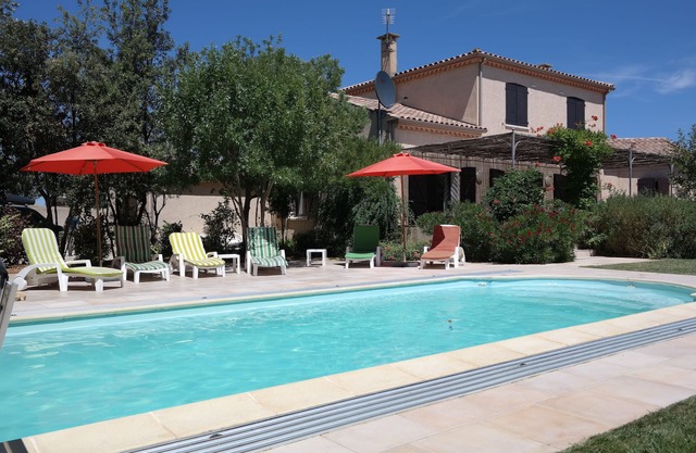 Large family friendly home with pool & beautiful garden, close to beach & shops.