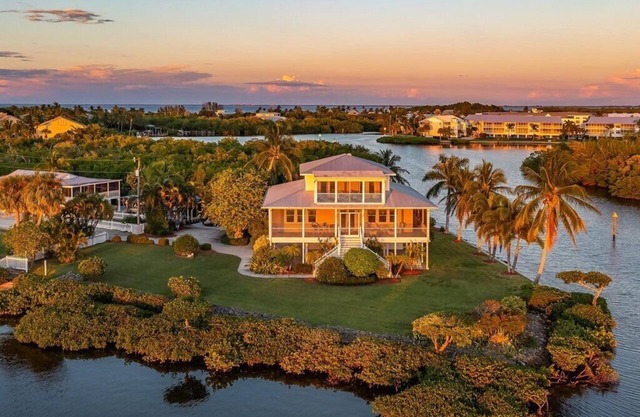Large home on private penninsula with waterfront and views on three sides.