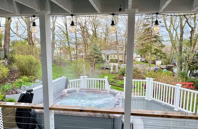 Large Outdoor Space with Saltwater Hot Tub, Fire Pit, Gardens, and Deck in OOB!