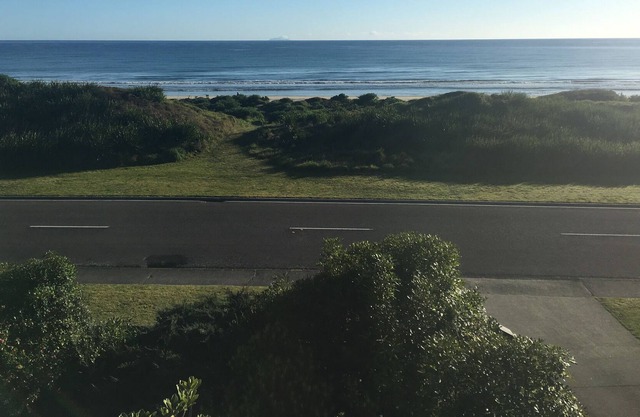 Large three storey bach on ocean road