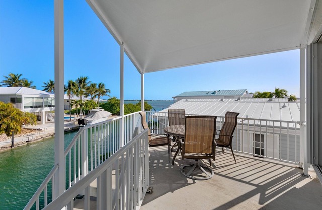 Latitude Adjustment #598, Canal front-Ocean Views