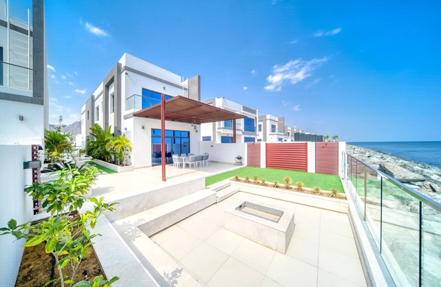 Lavish 4BR Villa w/2 Asst Rms, Al Dana Island, Fujairah by Deluxe Holiday Homes