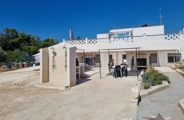 le Case di Pat: Palm home, 200mt from the beach and turquoise sea
