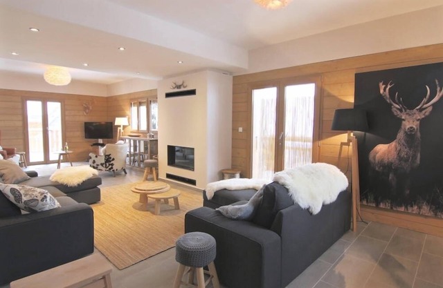 Le Chalet, a 12 person chalet with sauna, hot tub and you can ski from the door