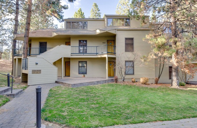 Location and Privacy in This Upper-Level Condo with Extra Amenities!