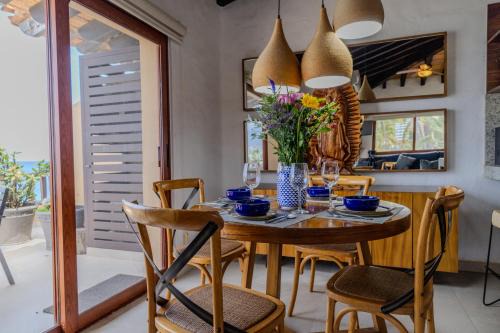 Los Tules 501 one bedroom apartment with ocean views and lush palm gardens