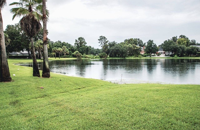 Luxe Townhome Retreat | Golf Resort & Lake View | Spacious 3BR with Workspaces & Screened Patio