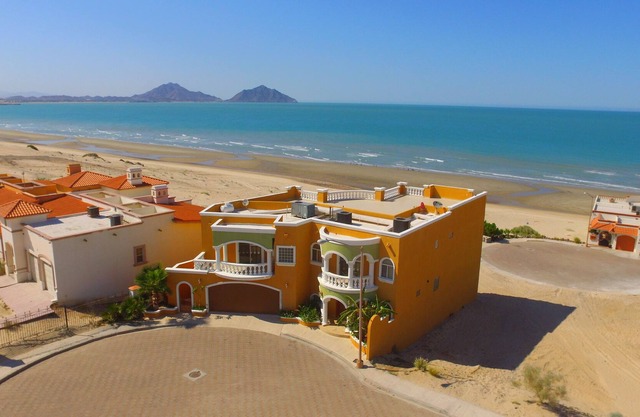Luxurious 3 Story Home On The Beach Sleeps 15 With Private Pool and Wifi.