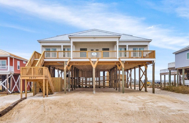 Luxurious 5/5 Waterfront Beach House on Dauphin Island's Sound Side featuring a