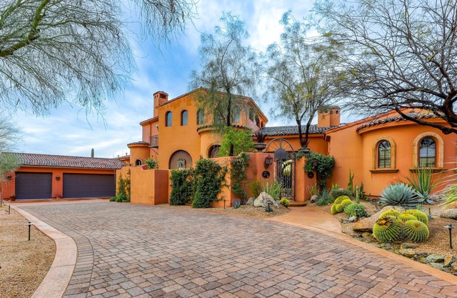 Luxurious retreat with pool, mountain views, fireplaces, firepit, & wet bar