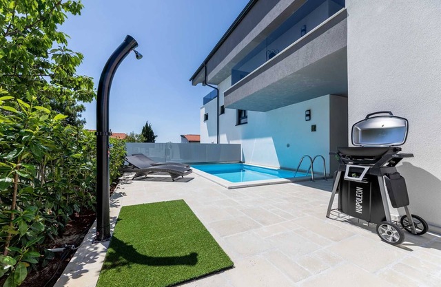 Luxury Apartment II. with a heated pool in Villa Adria Apartments