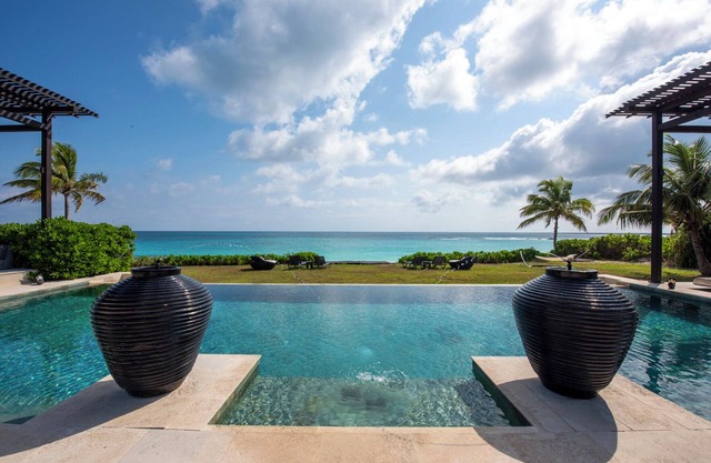 Luxury Beachfront Estate w/Htd Pool, Prime Banks Rd Location. Walk to Tippys!