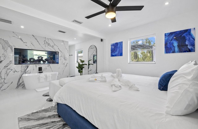 Luxury family friendly WATERFRONT home with a POOL, PLAYGROUND, FIREPIT & BEACH