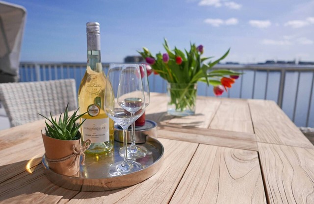 Luxury holiday apartment "Marina Lounge" in the Baltic Sea resort of Olpenitz for couples and families with a fantastic view of the water in all directions and high-quality furnishings for your well-deserved vacation