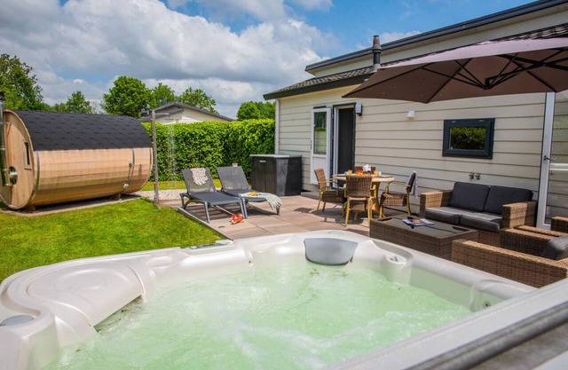 Luxury Holiday Chalet 1-4 persons with Private Jacuzzi, Private Sauna and Sun Shower.