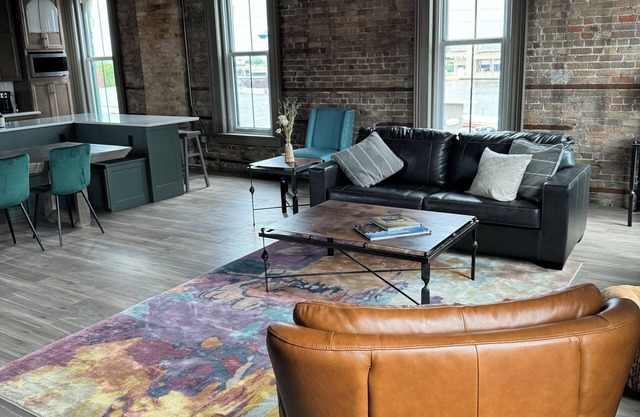Luxury Loft Riverfront Condo, prime Oshkosh location with spacious rooftop patio