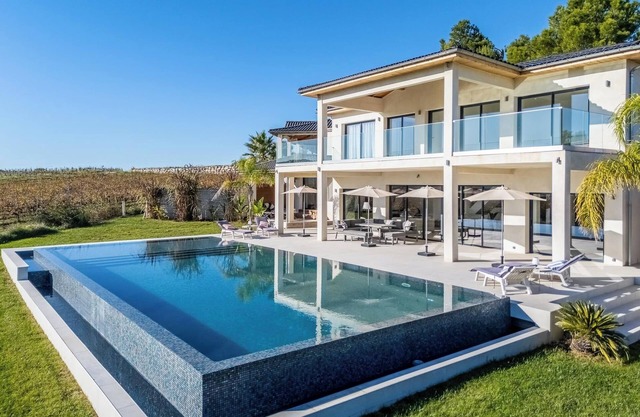 Luxury SCL villa heated mirror pool exotic garden vineyard